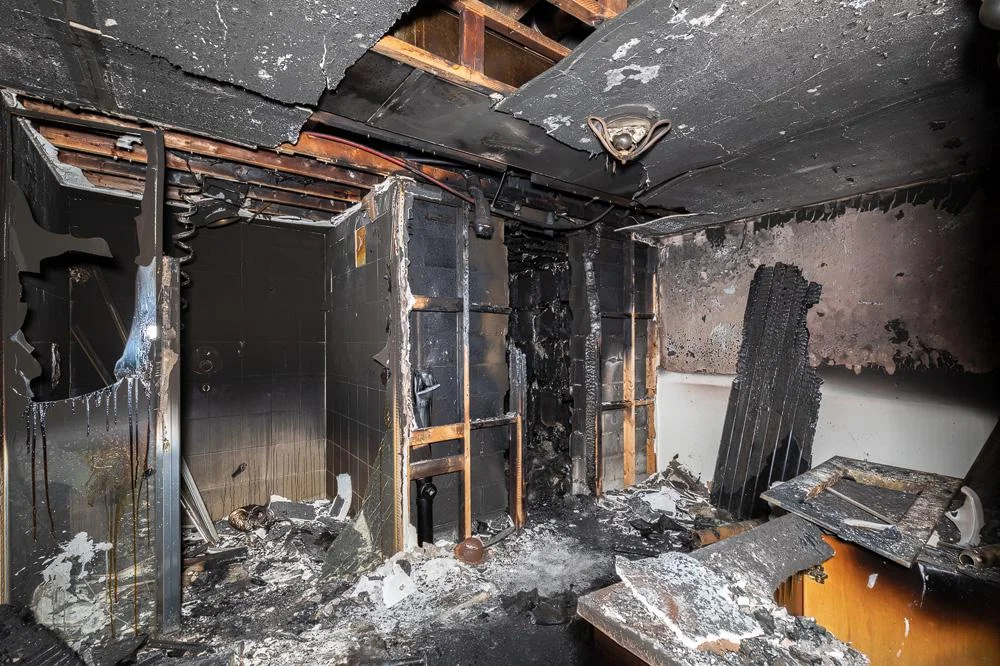 Severely damaged room from fire and urgently needs a fire damage restoration